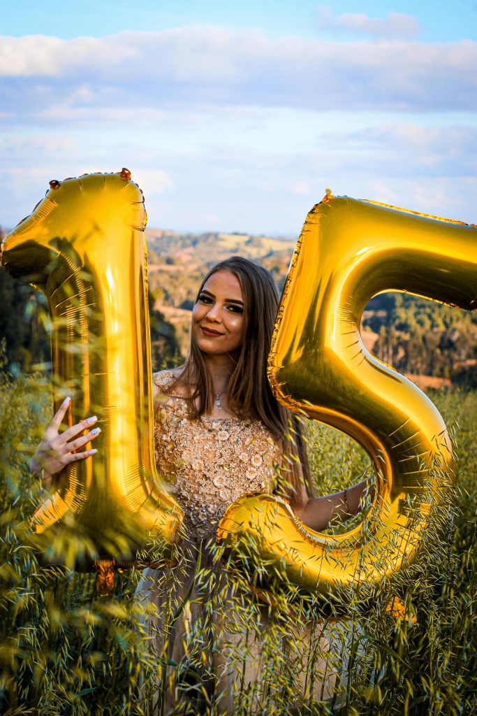 Woman Holding 15 Balloon